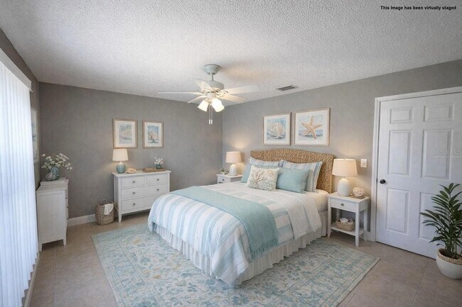 Building Photo - 6525 Manila Palm Way