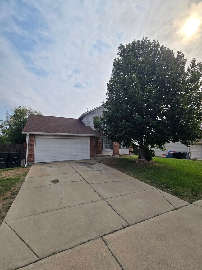 Building Photo - 3409 E 99th Dr