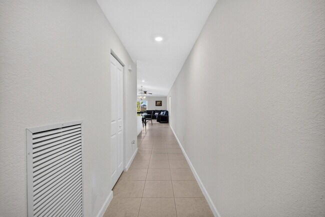 Building Photo - 5876 NW Sweetwood Dr