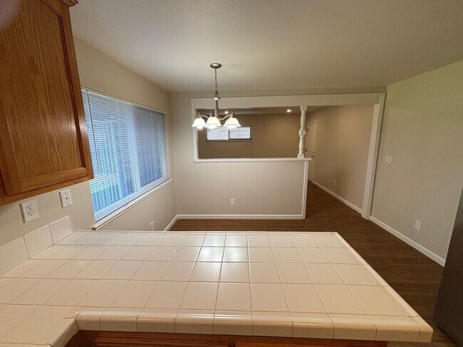 Building Photo - Updated Single level 3 bedroom 2 bathroom Bennett Valley Home with new paint and beautiful refini...