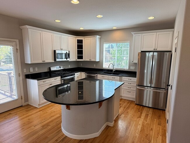 Building Photo - Modern 4-Bedroom Home in Renaissance Neighborhood Near Trails