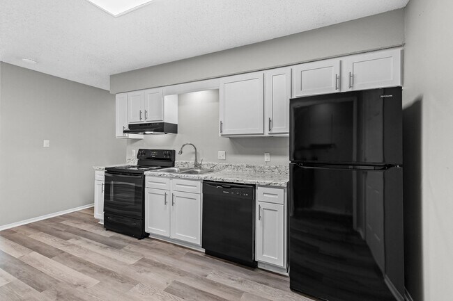 Building Photo - Cozy 2 Bedroom Duplex with Fireplace & Spacious Backyard!