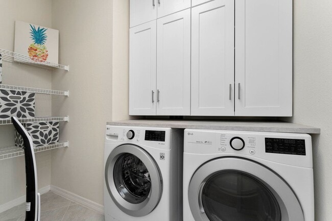 Building Photo - Introducing a captivating 3-story townhome...