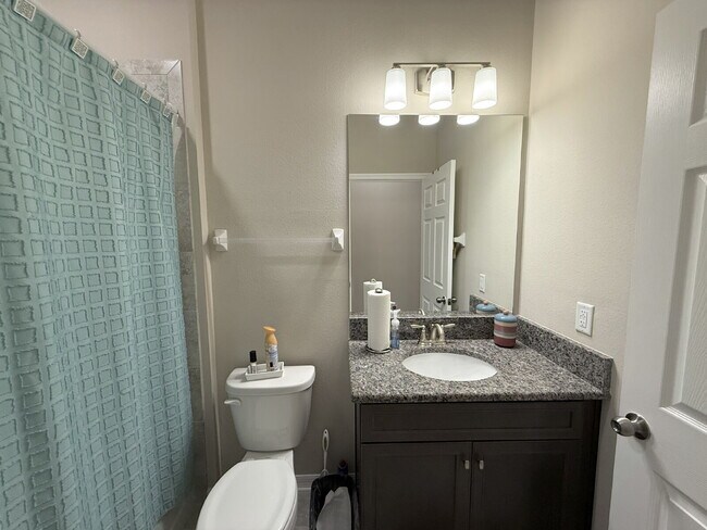 Building Photo - "Charming 3-Bed Oasis with 2 Full Baths in...
