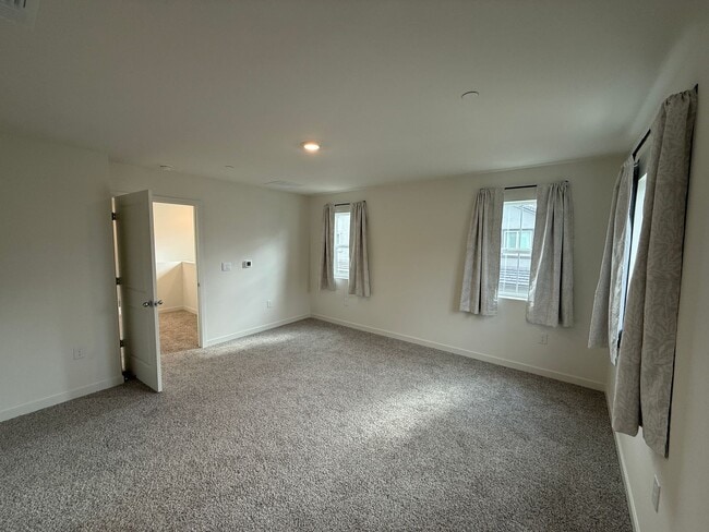 Building Photo - New Home in Gated Community