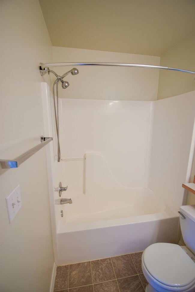 Building Photo - Astounding Condo  End Unit, Garage include...