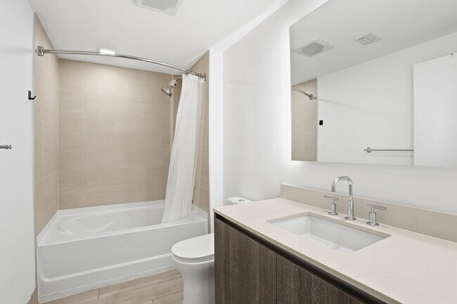 Building Photo - 111 SE 1st Ave