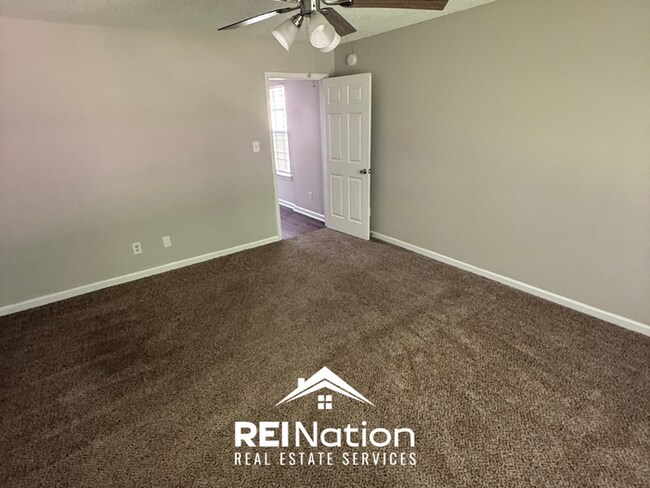 Building Photo - Move-In Ready 3BR Home in 38128 - Hardwood Floors, Attached Garage & Private Yard