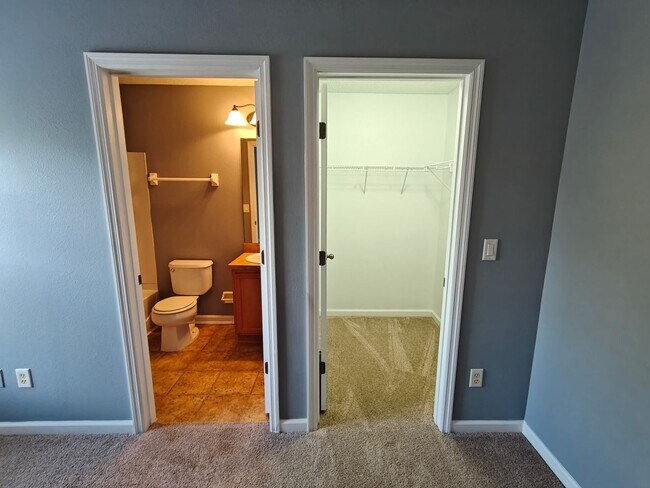 Building Photo - Spacious 2-Bed, 2.5-Bath Townhome with Gar...