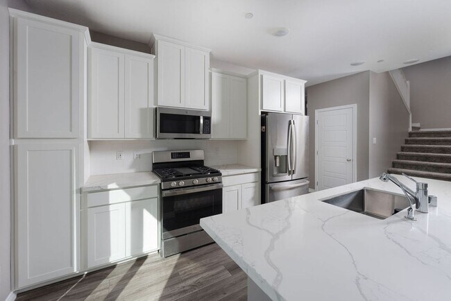 Building Photo - Modern Henderson Townhome with Loft & Resort-Style Amenities
