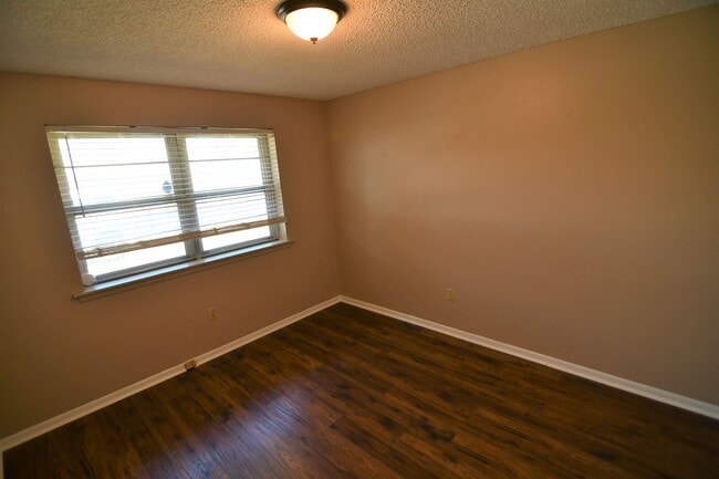 Building Photo - Location! Location!  Newly updated, 4 bedroom, 2 bath home near Perkins & Essens