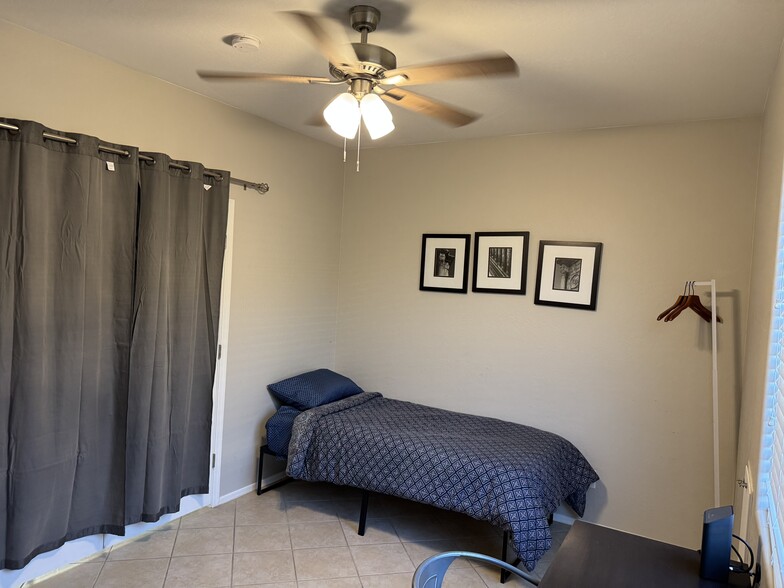 Downstairs office, bedroom. - 11872 W Alvarado Rd