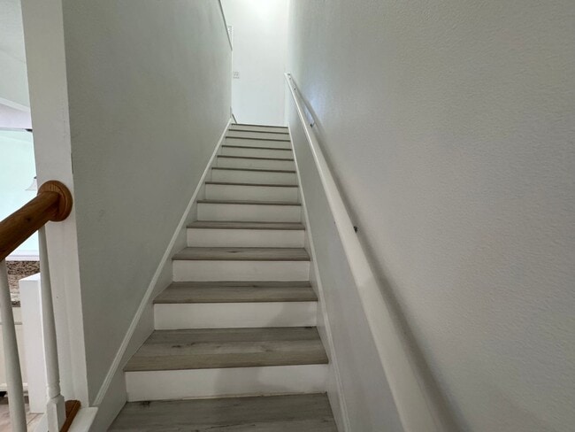 Building Photo - Lake Views. Upgraded Finishes. Gated Commu...