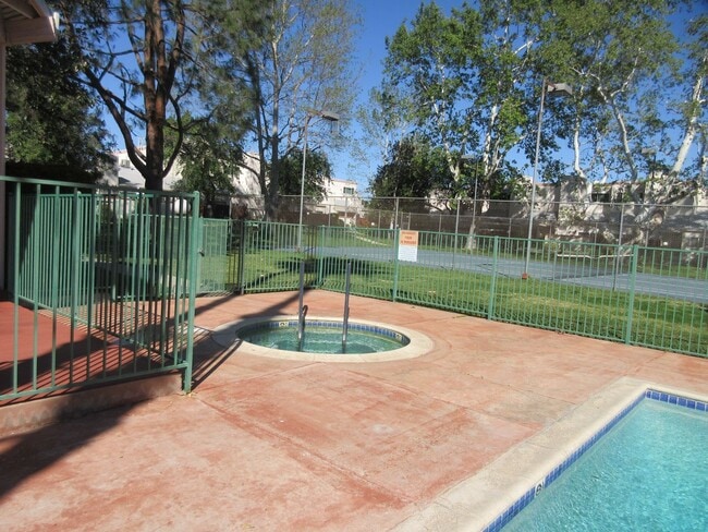 Building Photo - Duggan Property Management, Inc presents  *Reduced*  Canoga Park- 3BD 2.5BA