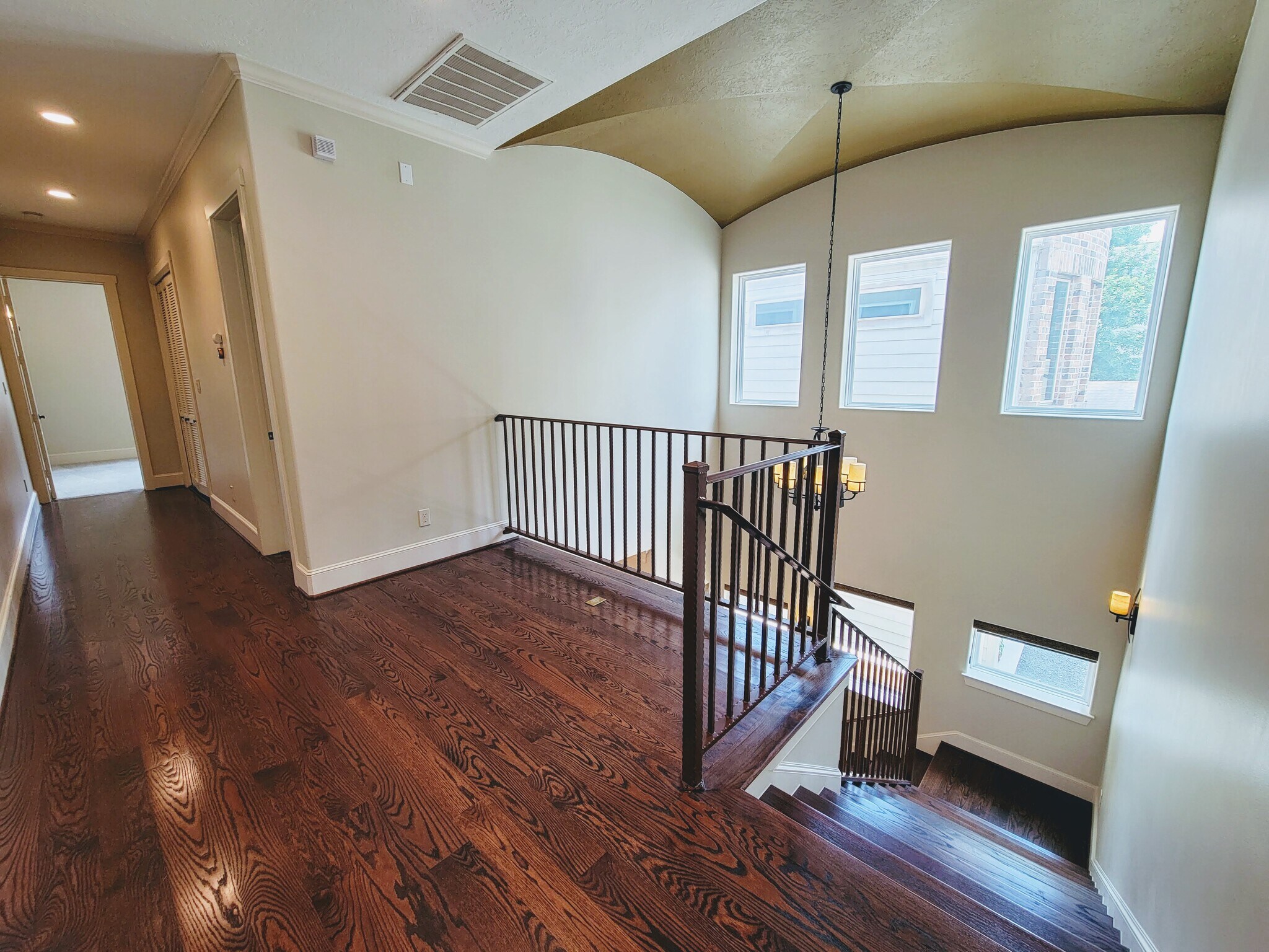 Second floor landing, high ceilings throughout home. - 6121 Hamman St