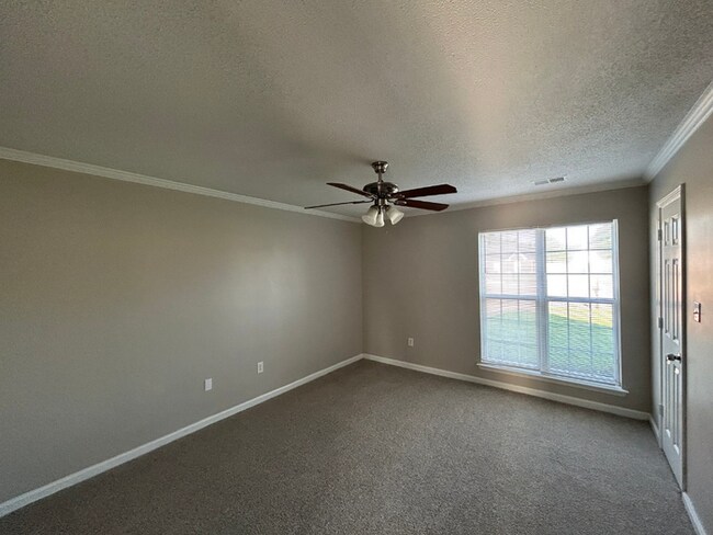 Building Photo - Spacious 4BR/2BA Olive Branch Home | 1,965 Sq Ft, Modern Fireplace, Bay Window & 2-Car Garage