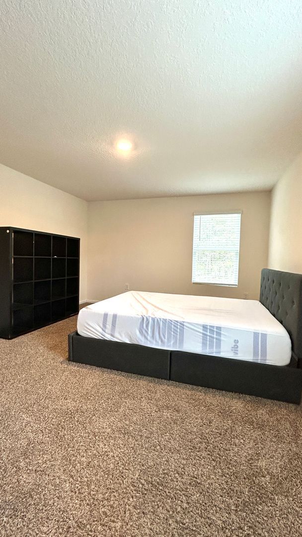 Building Photo - 4BR Home with Solar Panels + Whole-Home Water Filtration