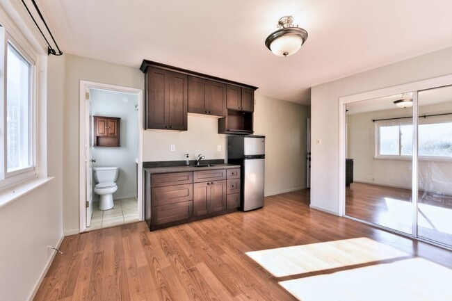 Building Photo - Light filled home+ Pet Friendly + Deck+ Lo...