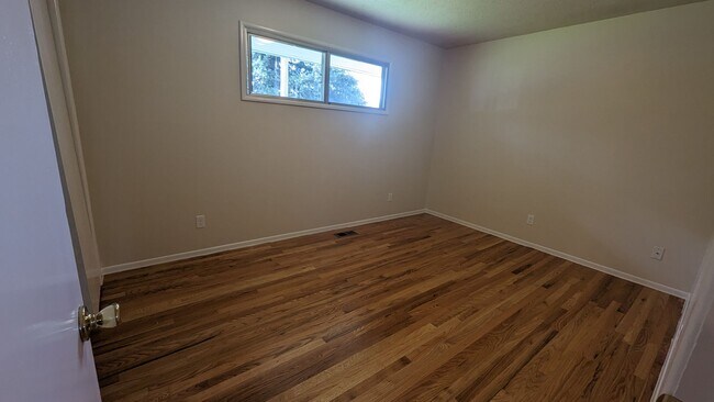 Building Photo - Spacious Three Bedroom with Large Backyard...