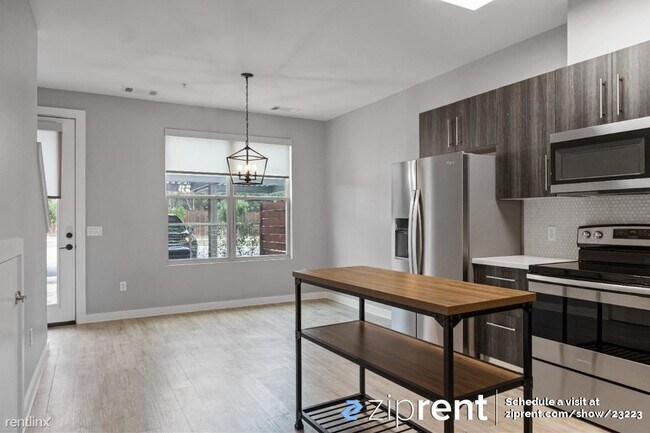 Building Photo - 2 br, 2.5 bath Townhome - 7805 Cooper Lane...