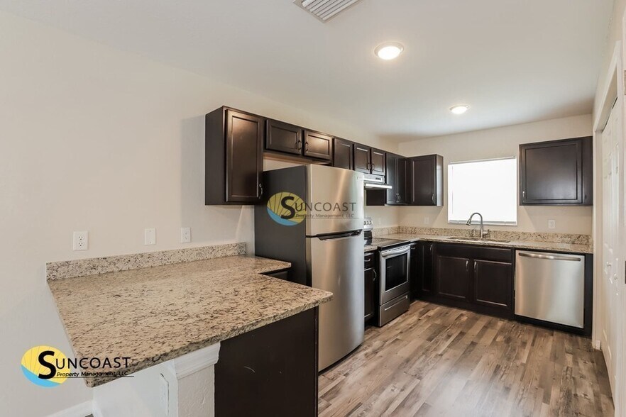 Building Photo - 9021 N Travis Dr