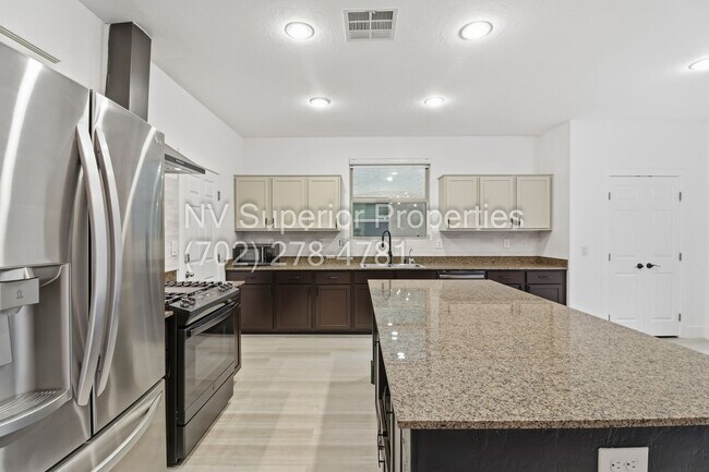 Building Photo - SW!! 2 Story 3 bedroom, 2 car garage!!! All Luxury Vinyl Plank flooring downstairs!!! Water condi...