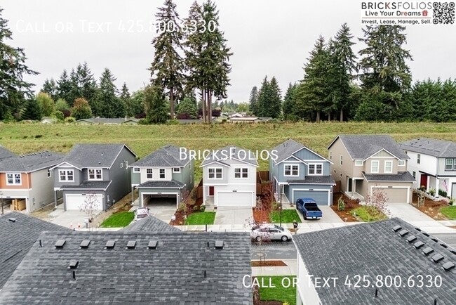 Building Photo - Welcome Home to The Dahlia at Kitsap Landi...