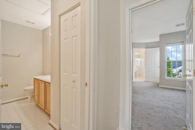 Building Photo - This beautifully maintained brick-front, three-level townhome is located in a highly sought-after...