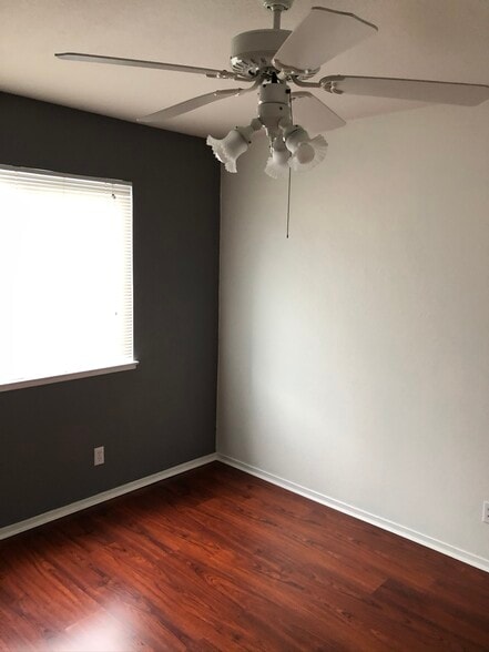 Bedroom #2 with large closet and ceiling fan - 445 Almond Dr. #29