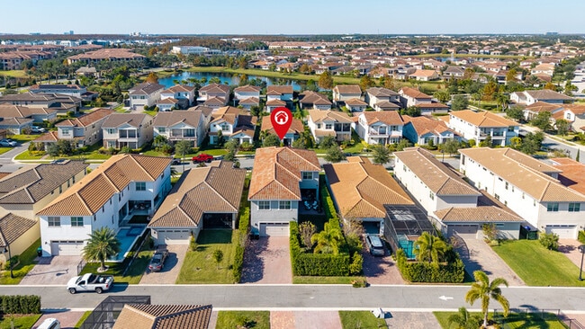 Building Photo - Luxury 5-Bedroom Residence in Eagle Creek with Indoor-Outdoor Living
