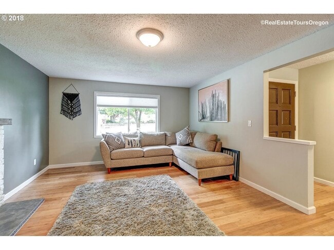 Building Photo - Spacious 4-Bedroom Home with Multiple Livi...
