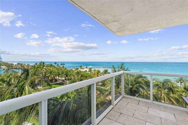 Building Photo - 10275 Collins Ave