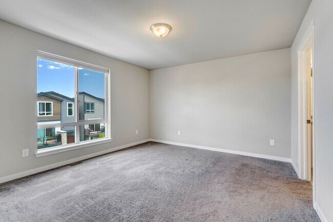 Building Photo - Modern 4BR with Open Kitchen, Patio & 2-Car Garage