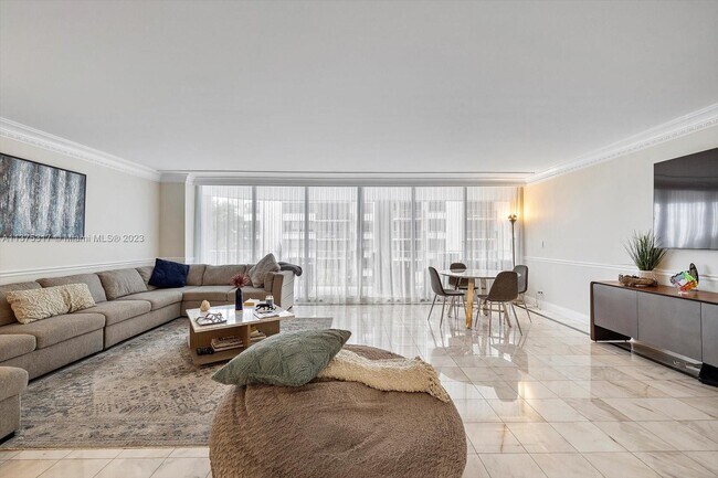 Building Photo - 10155 Collins Ave