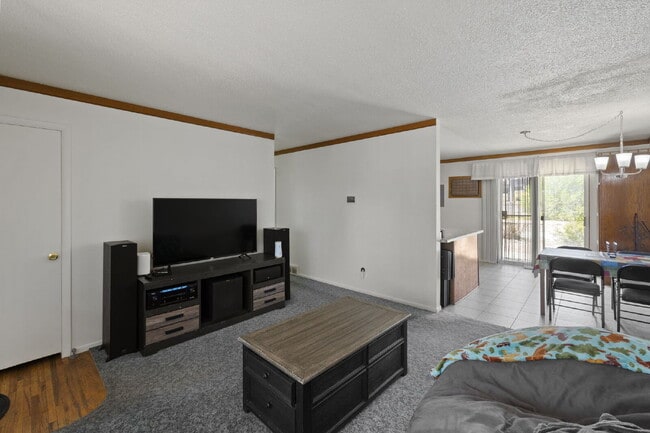 Building Photo - Updated 2 Bed + Bonus Workshop | Huge Backyard | Two Storage Sheds | Carport | Pet Friendly