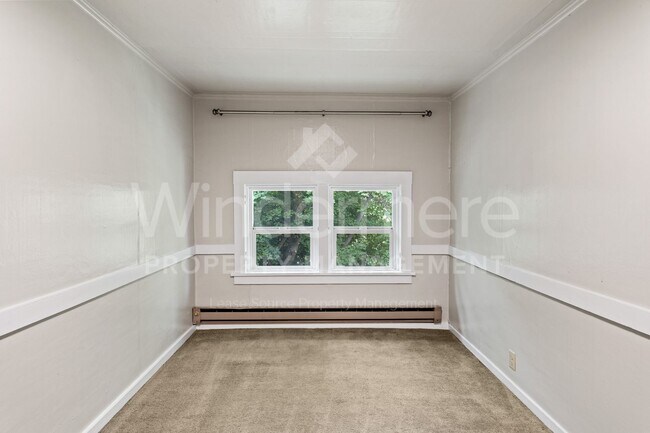 Building Photo - 1321 W 11th Ave