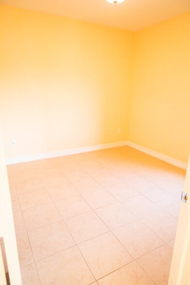 Guest bedroom or office, with closet, view of pickle-ball courts - 2743 1st St