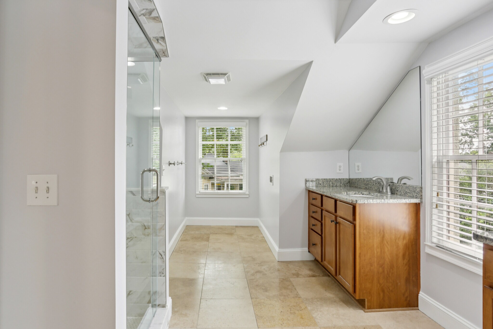 Large primary bathroom, newly renovated shower with double vanity and walk in closet - 781 Rosedale Ave SE