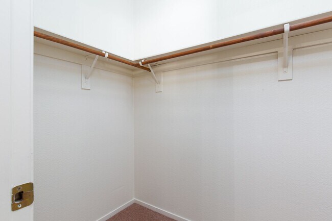 Building Photo - Two bedroom townhome with garage in gated ...