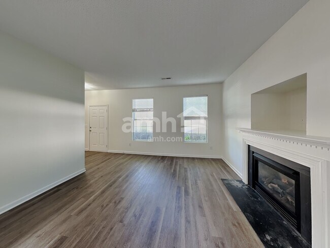 Building Photo - 5202 Carriage Woods Dr