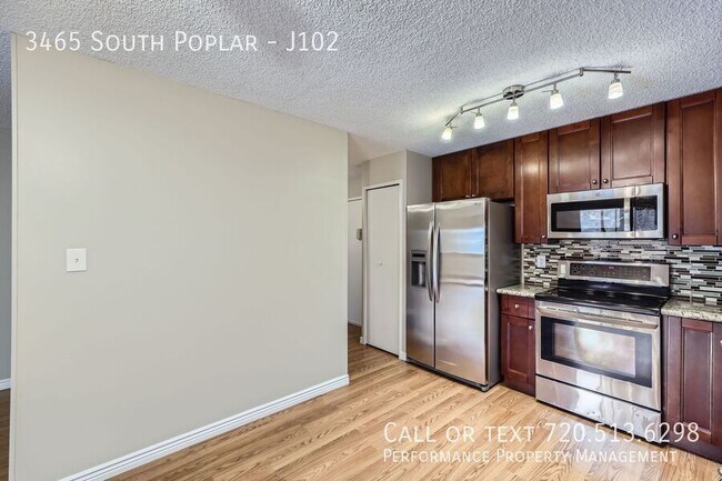 Building Photo - 3465 South Poplar-J102