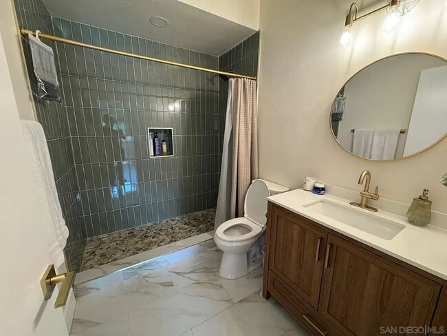 Building Photo - Studio rental available in a beautifully renovated single-story ranch property located in the hig...