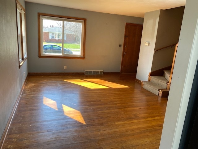 Living room with authentic hardwood floors - 717 N Highland Ave