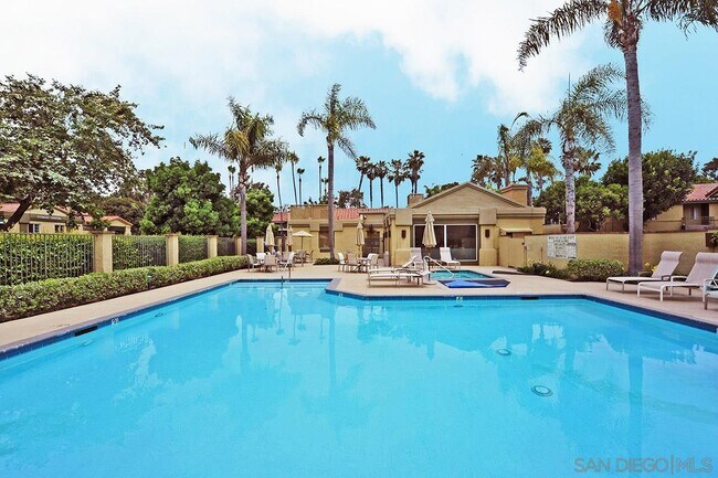 Building Photo - 7565 Charmant Dr