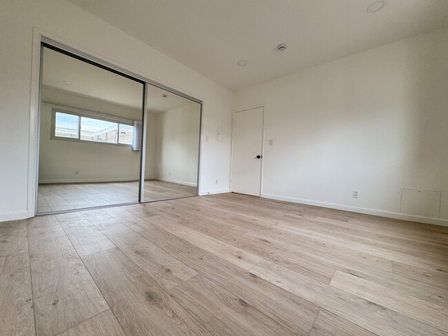 Bedroom with sliding glass mirror closets - 2721 2nd St