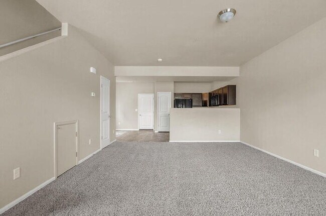 Building Photo - Modern Townhome with Central A/C, 2-Car Ga...
