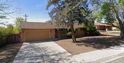 Building Photo - Spacious 6-Bedroom Home Near UNR with Backyard & Modern Kitchen