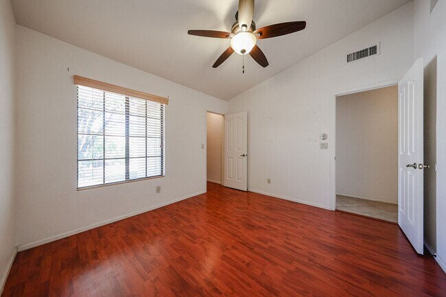 Building Photo - Welcome to this stunning 4-bedroom, 2-bath...