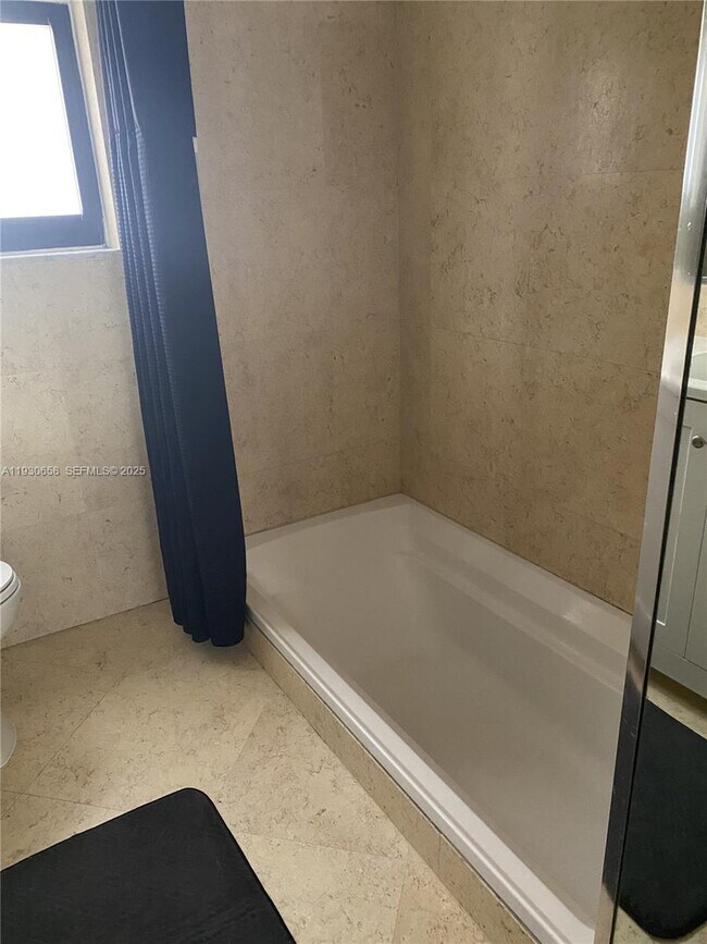 Building Photo - 8950 Collins Ave