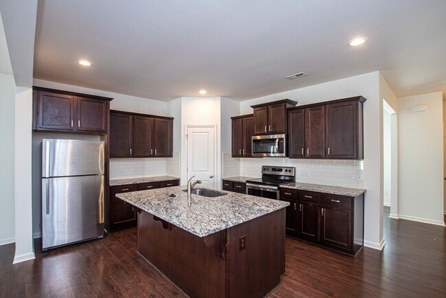 Building Photo - 2-Car Garage Bonterra Townhome